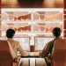 AI tradebot analyzes market data on computer screens.