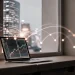 Smarter digital banking on laptop displaying financial charts.