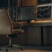 AI-powered stock trading platform displaying market data on multiple monitors.