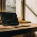 Premium wealth automation tools displayed on a laptop.