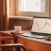 Stock market chart on laptop.
