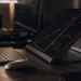 AI quantitative trading app displayed on tablet with keyboard and mouse.