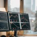 Free trading bot automating portfolio management on dual monitors.