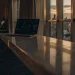 Hedge fund manager analyzing market data on laptop.
